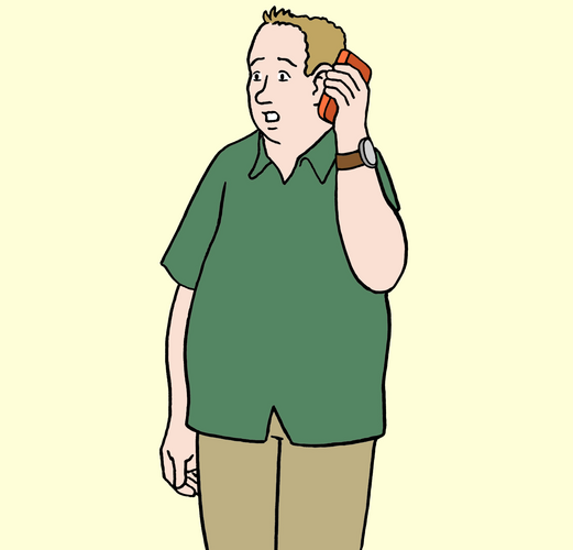 Ein Mann telefoniert im Stehen.